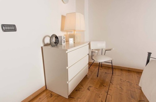 Monti Apartment | Suite Frangipane: beautiful penthouse overlooking the Roman Forum and the Colosseum