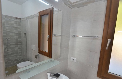 Capoliveri Apartment | Two semi-detached houses in the immediate vicinity, for a total of three apartments on a 5-acre lot.