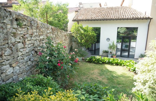 Foligno House | Umbria Hideout Villa surrounded by a green view from the garden through the hill