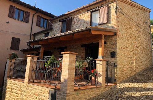 Smerillo House | Vacation home IL VECCHIO BORGO, in front of the beautiful setting of the Sibillini Mountains