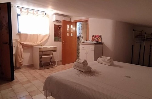 Santo Spirito Apartment | Via Pisa 20 Mansarda