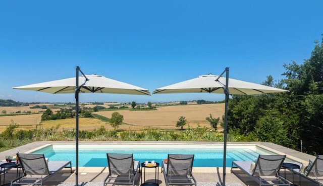 A barn retreat in Italy's UNESCO-designated wine region, featuring beautiful views and a pool