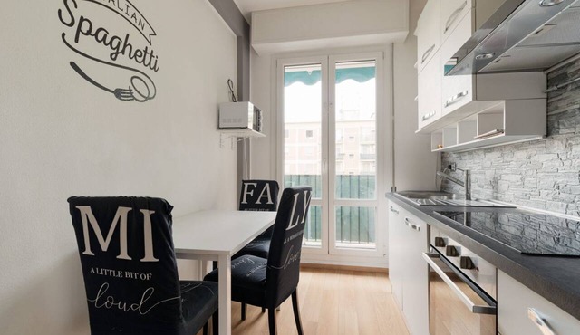 A cozy 70 sqm apartment, ideal for 4 people, located on the 4th floor of a building with an elevator.The property is situated in the Quartiere degli Olmi, a residential area in western Milan.Surrounded by expansive green spaces, the neighborhood offers a