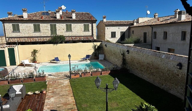 Apartment in a village with swimming pool