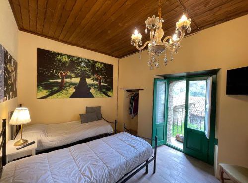 Casa dell'Arte - Camere Standard con bagno condiviso