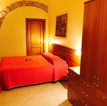 Corato room economy