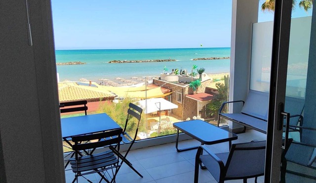 newly built seafront apartment (unit 4), beach umbrella + 2 sunbeds included