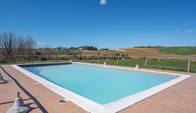 Nice apartment in villa for 7 guests with WIFI, pool, TV, patio and pets allowed