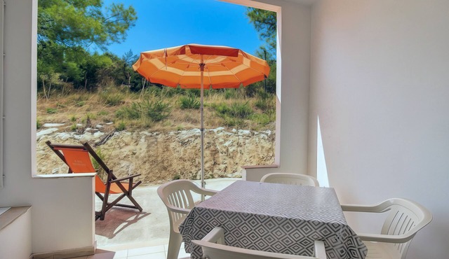Property in a holiday village 'Baia Falcone - Standard 305' with sea view and air conditioning