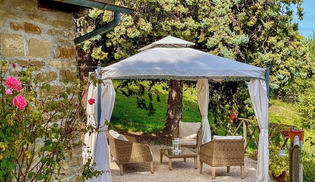 Stone cottage with view of Gubbio and shared pool