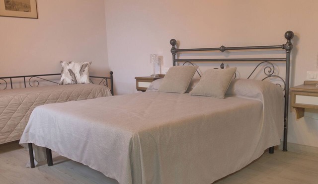Two-room apartment with 1 double bed, 1 single bed, and a kitchen