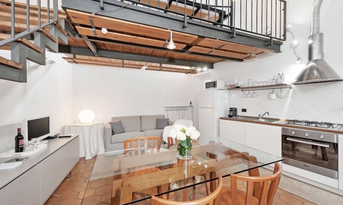 Monti Apartment | Suite Frangipane: beautiful penthouse overlooking the Roman Forum and the Colosseum
