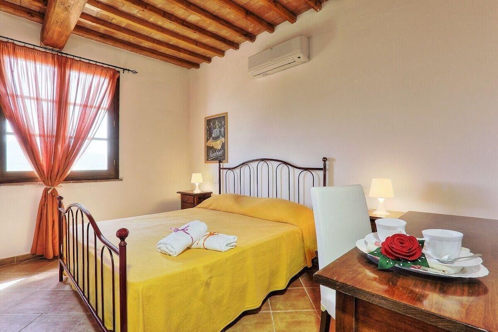 Photo of Bedroom in Montecatini Val di Cecina