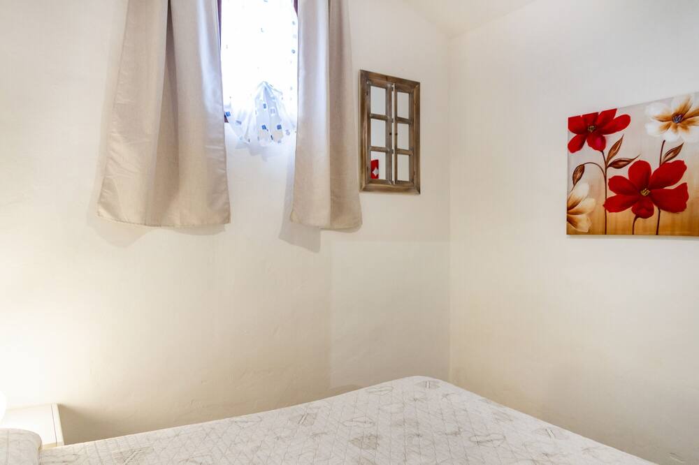 Photo of Bedroom in Orbetello