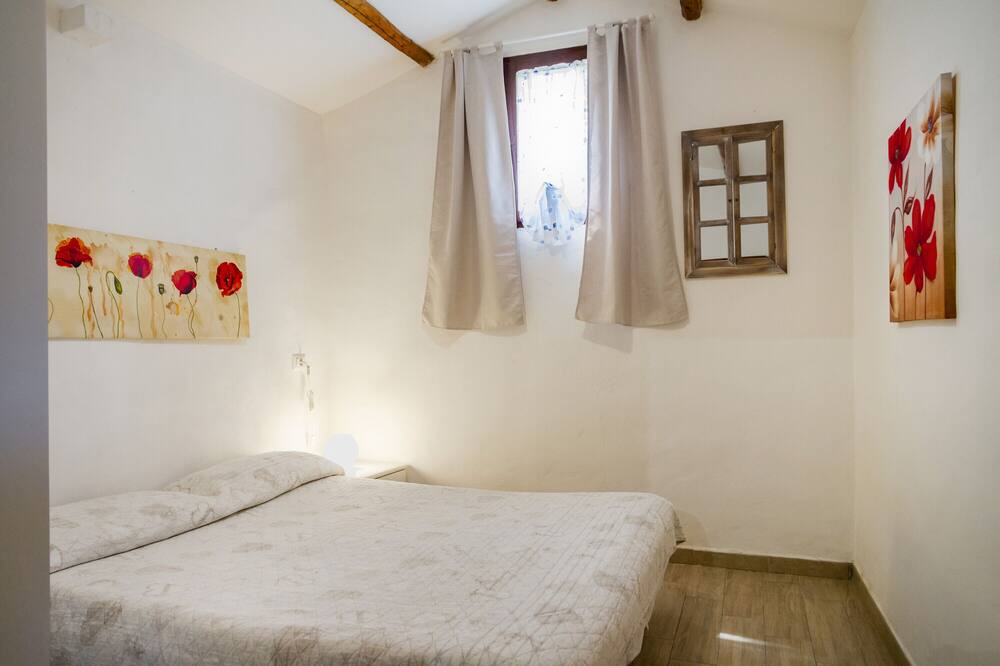 Photo of Bedroom in Orbetello