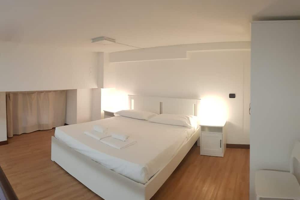 Photo of Bedroom in Tricolore