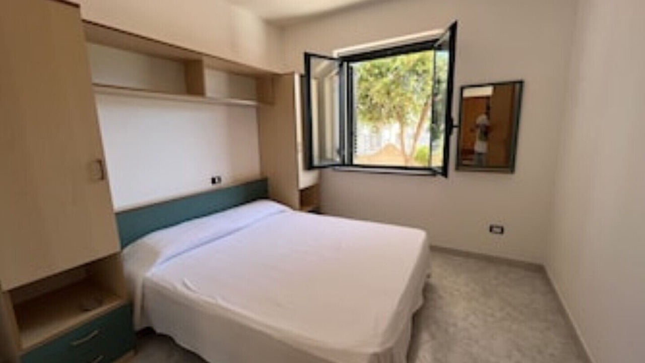 Photo of Bedroom in Villaggio Carrao