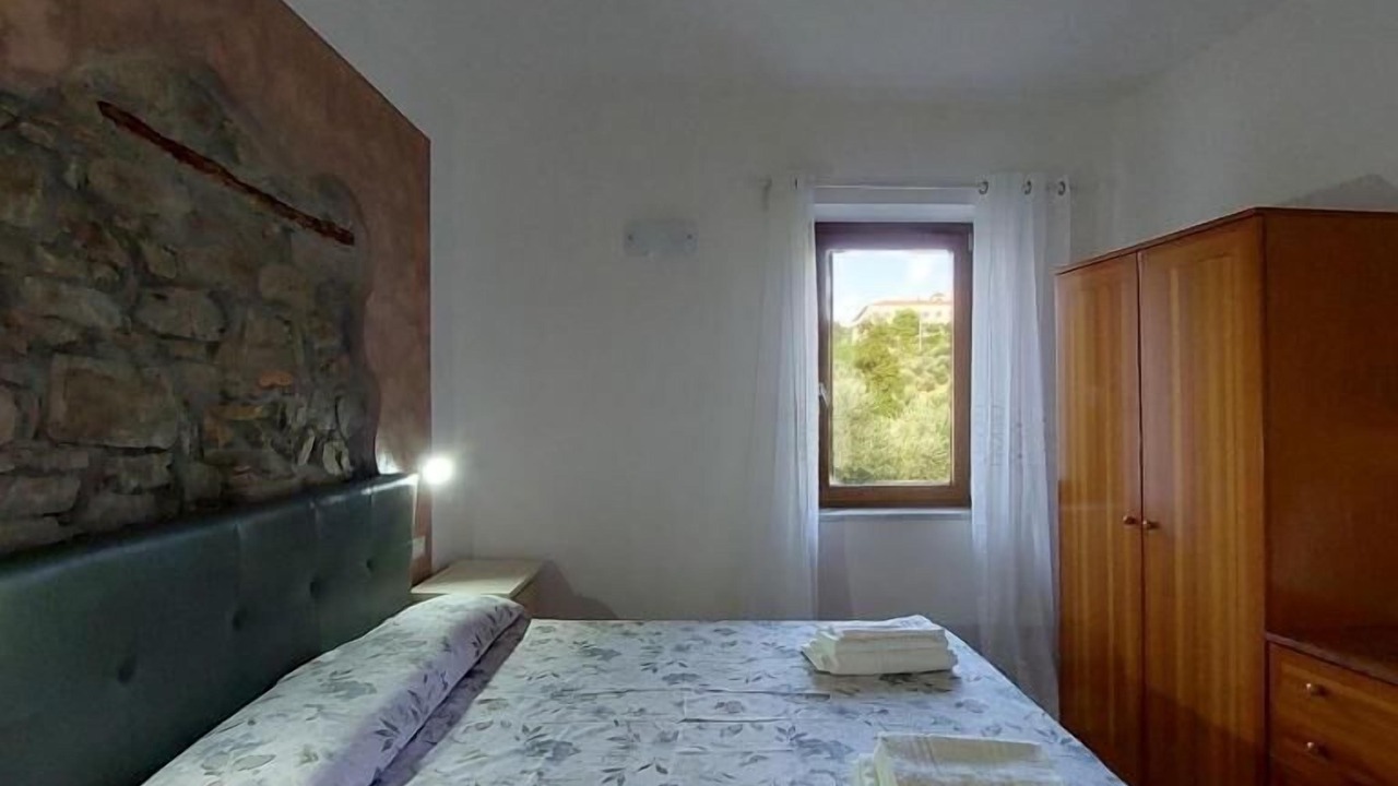 Photo of Bedroom in Laureana Cilento