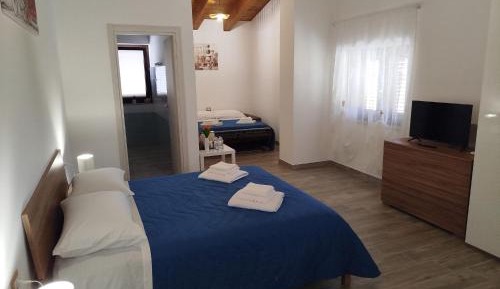 Quadruple Room with Private Bathroom