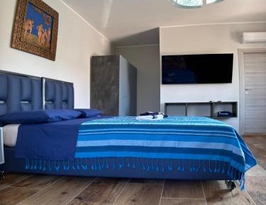 Camera Matrimoniale superior con terrazza privata e poltroncina letto