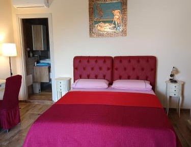 Camera Matrimoniale superior con terrazza privata e poltroncina letto