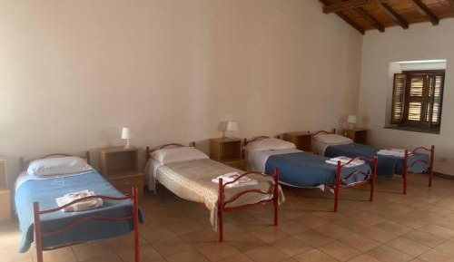 Quadruple Room with Private Bathroom