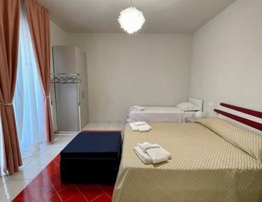 Quadruple Room with Private Bathroom