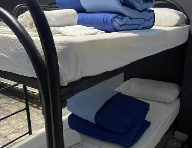 Single Bed in Male Dormitory Room with Shared Bathroom