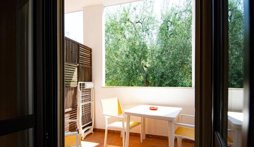 Junior Suite with Balcony and Garden View
